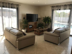 Villa with heated pool in walking distance to sea